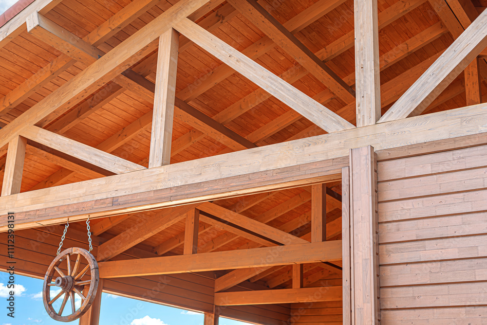 Construction of a wooden roof of a frame house.