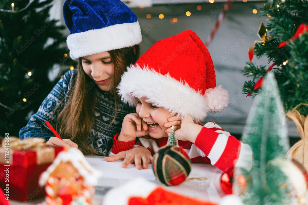 Toddler boy and girl write a letter to Santa. Christmas holidays concept. Toddler boy and girl write a letter to Santa. Christmas holidays concept.