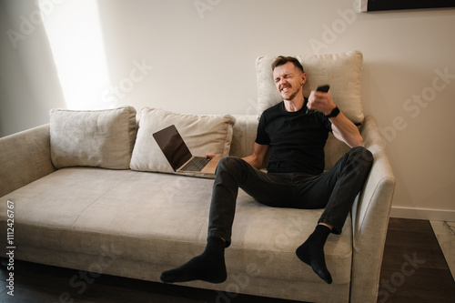 Businessman analyst trader winner. Fortune, winning, win, concept. Extremely happy man reading cool news on financial market. Stock Market Rise. Trading online investment data on stock market graph.