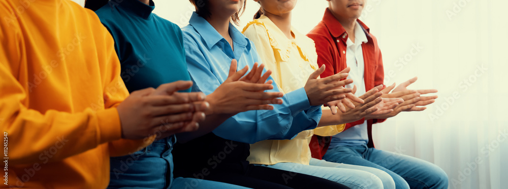 Fototapeta premium Group of startup company employee gather in line at corporate event to applaud achievement and celebrate company's success or business presentation meeting with audience in panorama banner. Synergic