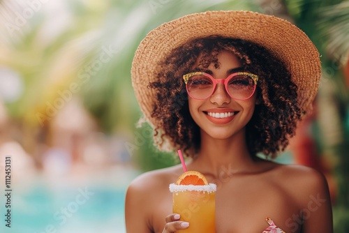 Fit model woman with a straw hat and pink sunglasses hold coctail a studio background, fuill body, vibrant swimming suit photo