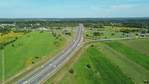 Aerial highway view through forest landscape