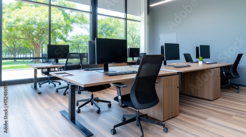 Modern Coworking Space with Computer Monitors and Natural Light