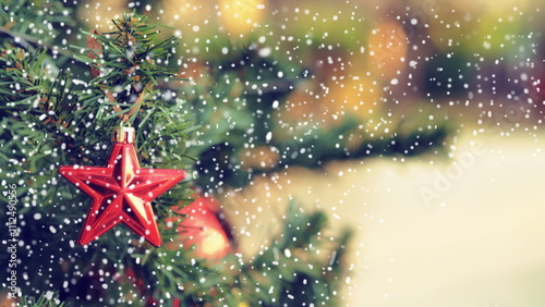 Christmas Background. Christmas background with snowflakes and bokeh lights.Snow on branches of christmas tree in sunny winter forest