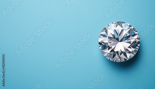 Sparkling diamond on a vibrant blue background, showcasing brilliance and elegance in a minimalist setting. photo