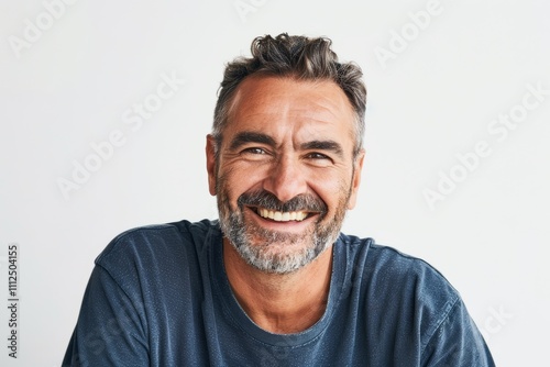 Portrait of a happy caucasian man in his 40s donning a trendy cropped top in white background