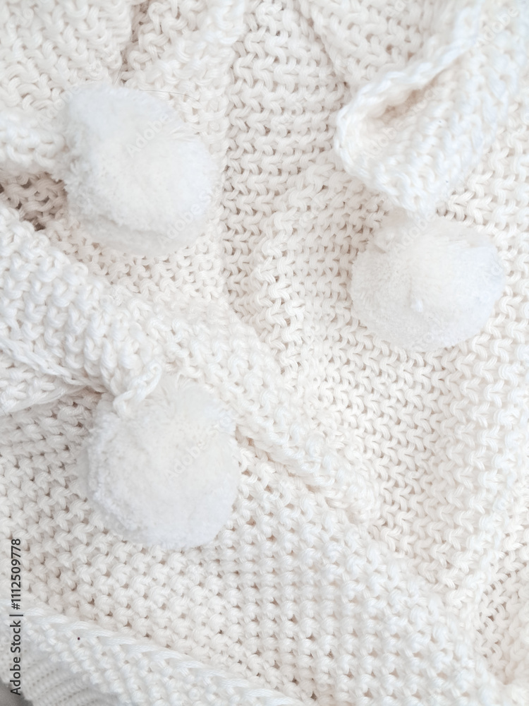 A detailed view of a white knitted plaid background, showcasing delicate woven textures. A detailed view of a white knitted plaid background, showcasing delicate woven textures.