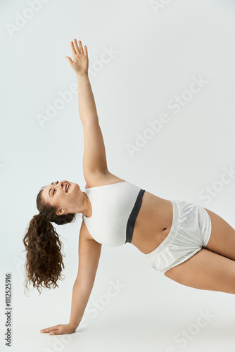 Wallpaper Mural A young plus size woman poses playfully in stylish underwear, radiating confidence and beauty. Torontodigital.ca