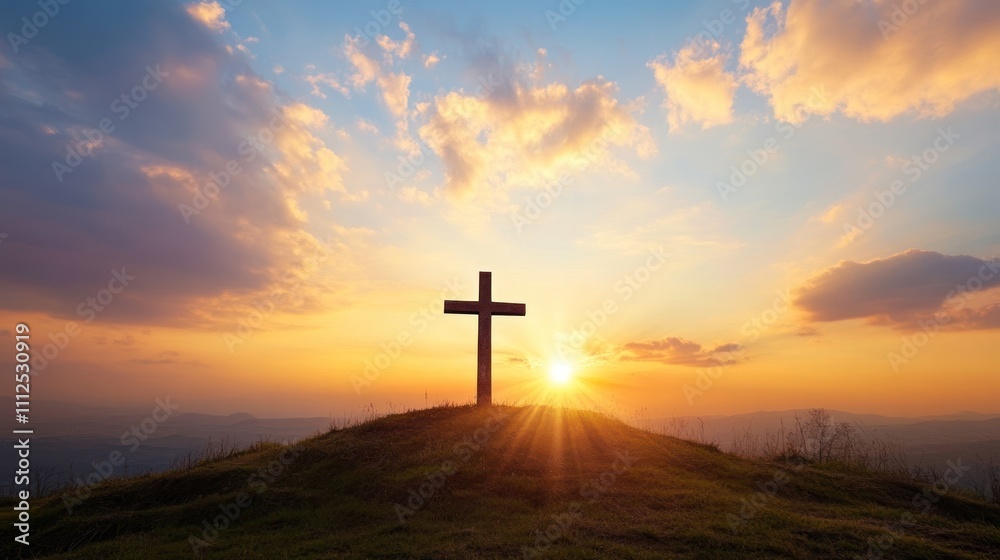 Sunrise behind a cross on a serene grassy hilltop Sunrise behind a cross on a serene grassy hilltop