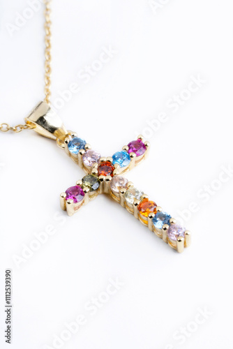 cross earring with colored stones