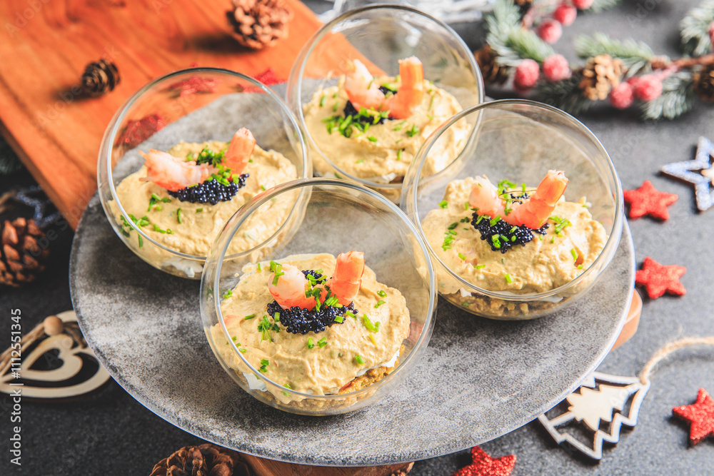 Verrine avocado shrimp pink fresh cheese guacamole chives cream lumpfish roe - decorated for Christmas