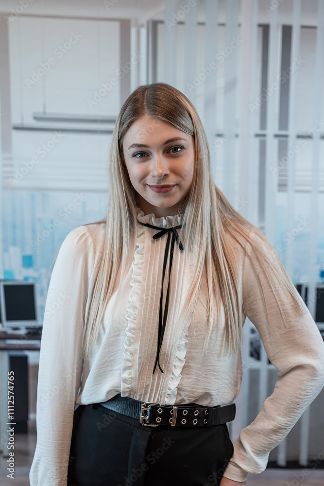 Fototapeta premium Modern business female worker in white t-shirt in the office