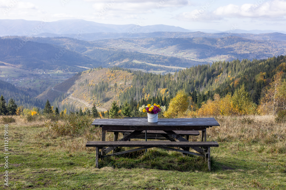 Wooden tables in the mountains Wooden tables in the mountains