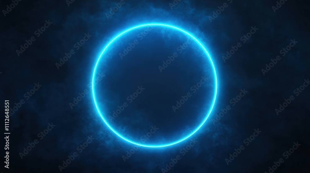 Fototapeta premium A glowing blue circular light against a dark, smoky background, creating a futuristic ambiance.