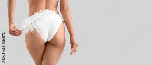 Young woman in underwear ho...