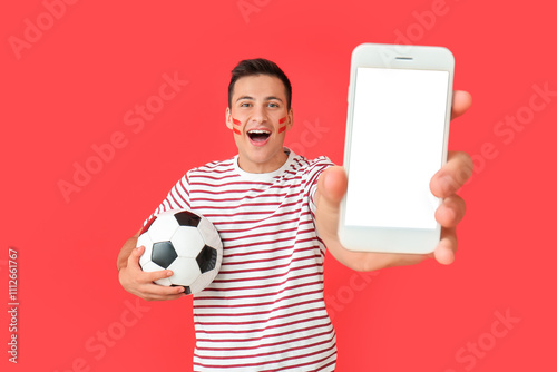 Happy man with soccer ball ...