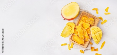 Fresh and dried mango on li...