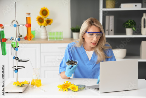Female scientist with flask...