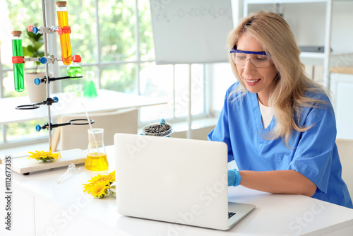 Happy female scientist with...