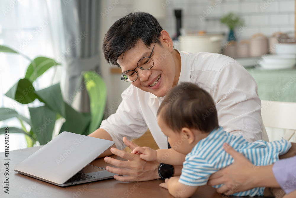 Asian baby and families who have to work while raising children at home Asian baby and families who have to work while raising children at home
