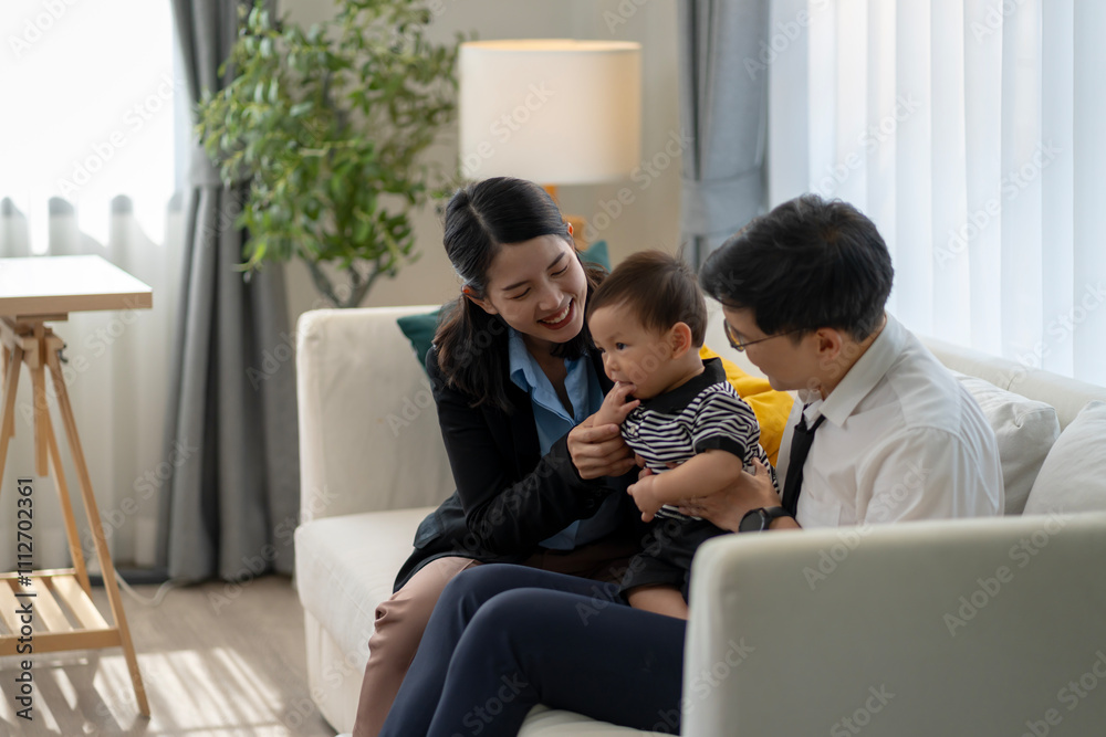 Asian baby and families who have to work while raising children at home Asian baby and families who have to work while raising children at home