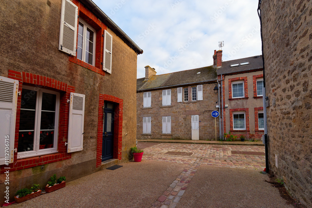 Old street in Barfleur city in Normandy coast. Old street in Barfleur city in Normandy coast.