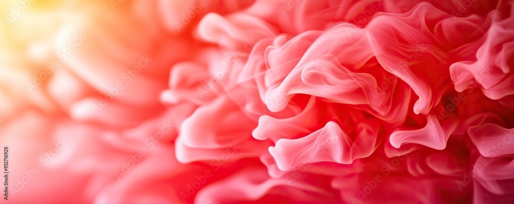 A vibrant close-up of swirling pink and red hues, resembling abstract waves or smoke, creating a soft and dreamy atmosphere.