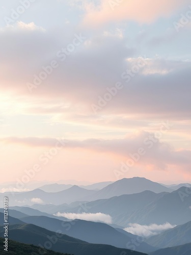 soft pastel colors of cloudy skies above rolling hills and mountain ridges, rolling hills, natural scenery