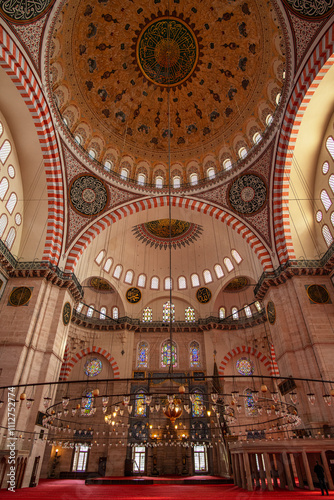 Stunning interior of the Suleymaniye Mosque in Istanbul. Designed by the imperial architect Mimar Sinan, it was inaugurated in 1557.