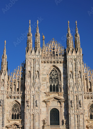 facade of thereligious architecture, with the golden statue of the Madonna