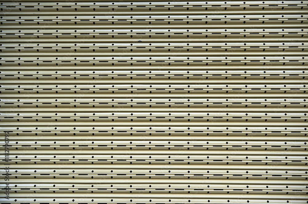 Metal blinds with shelves with circular and rectangular perforations Metal blinds with shelves with circular and rectangular perforations