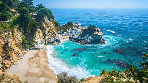 A beautiful beach with a rocky cliff overlooking the ocean photo