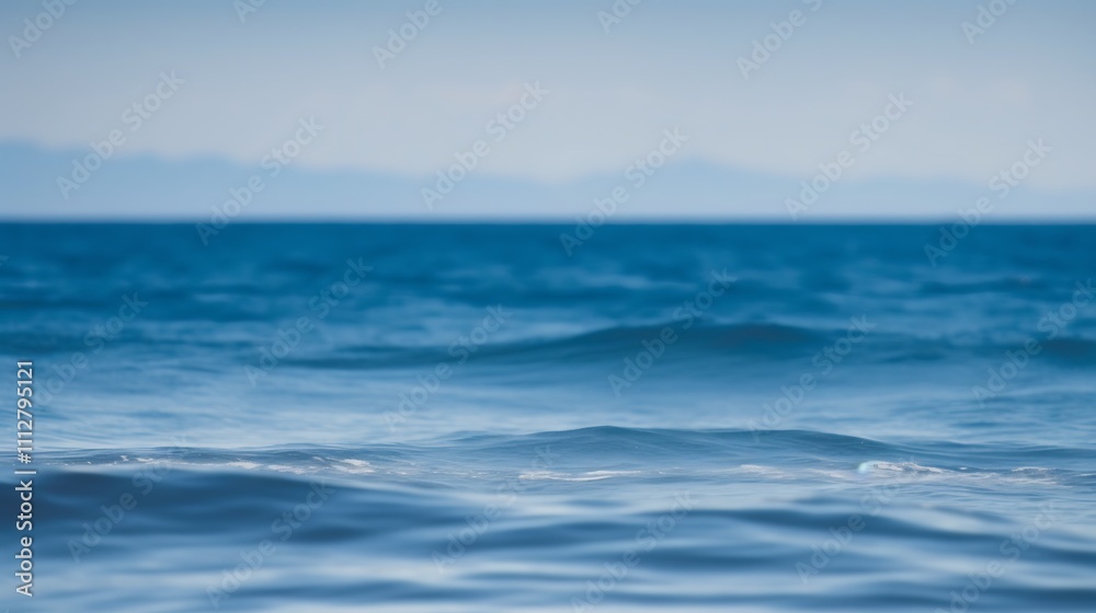 Tranquil Ocean Waves Under A Calm Sky Tranquil Ocean Waves Under A Calm Sky