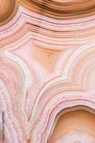 Macrophotograph revealing intricate layers of Laguna agate