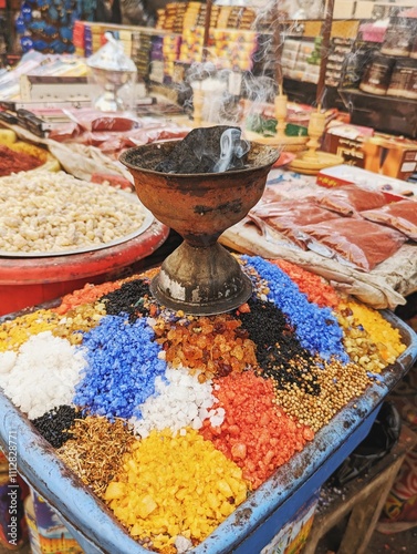 Colorful incense burns photo