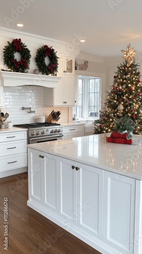 Beautifully decorated kitchen with Christmas tree and festive wreaths during ...