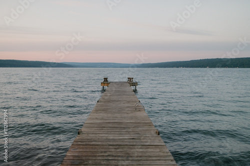 A board walk overlooking a lake photo