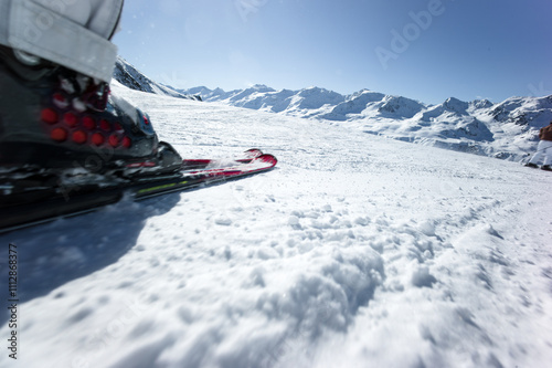 Close up of skier racing downhill photo