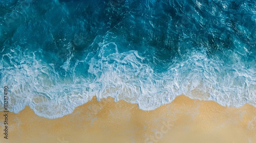 A view of a beach with waves crashing on the sand