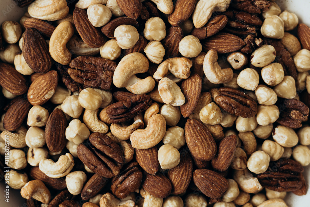 Assorted nuts creating a delicious and nutritious mix Assorted nuts creating a delicious and nutritious mix