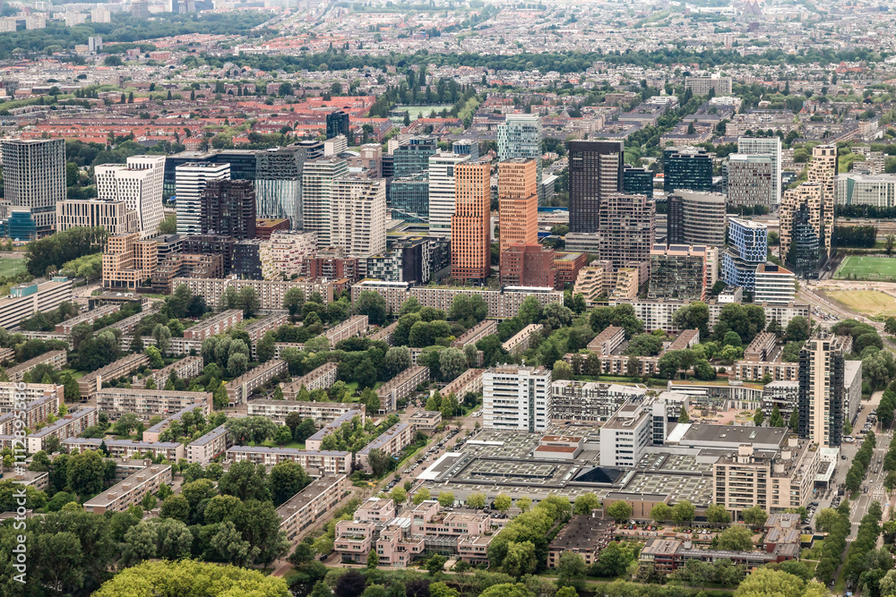 Aerial view of the Zuidas, the business, legal and financial district of Amsterdam with many high-rise apartments and office buildings. Aerial view of the Zuidas, the business, legal and financial district of Amsterdam with many high-rise apartments and office buildings.