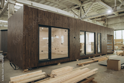 Modular building under construction in large industrial facility