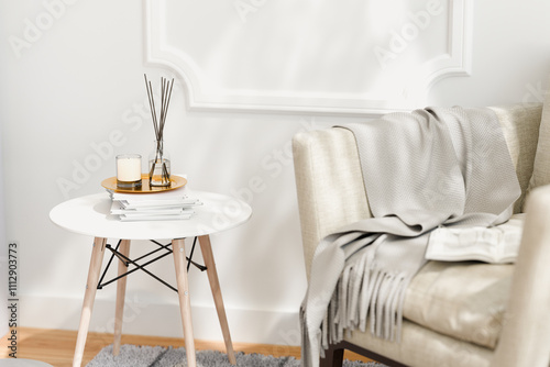 Cozy living room with fragrance scent diffuser and candle.