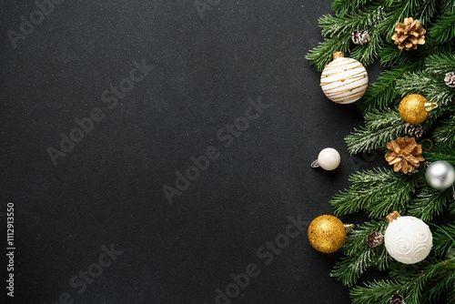Obraz na płótnie Christmas decorations and spruce tree at black background. Flat lay with copy space. w salonie