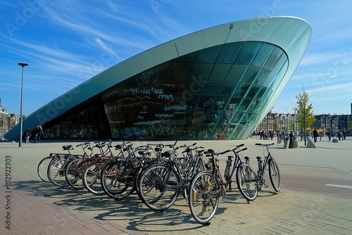 Street view of Mannerheiminaukio, Helsinki, Finland, with bikes parked near Kiasma Museum photo