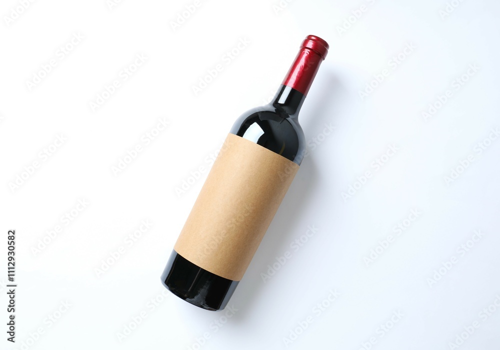 Obraz premium Bottle of red wine on white background