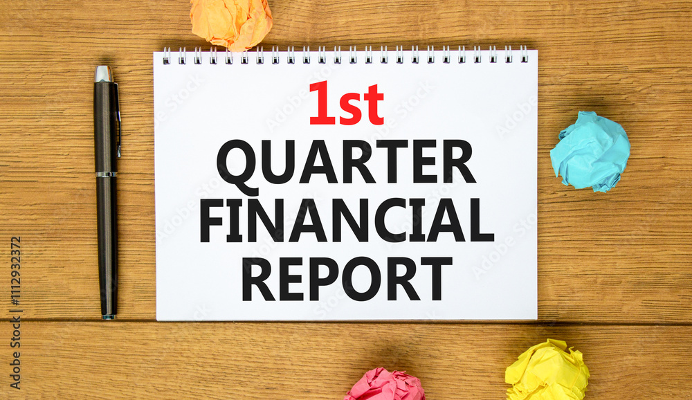 Fototapeta premium 1st quarter financial report symbol. Concept words 1st quarter financial report on beautiful white note. Beautiful wooden background. Business 1st quarter financial report concept. Copy space.