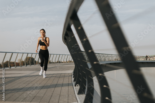 Joyful jogger enjoying a mo...