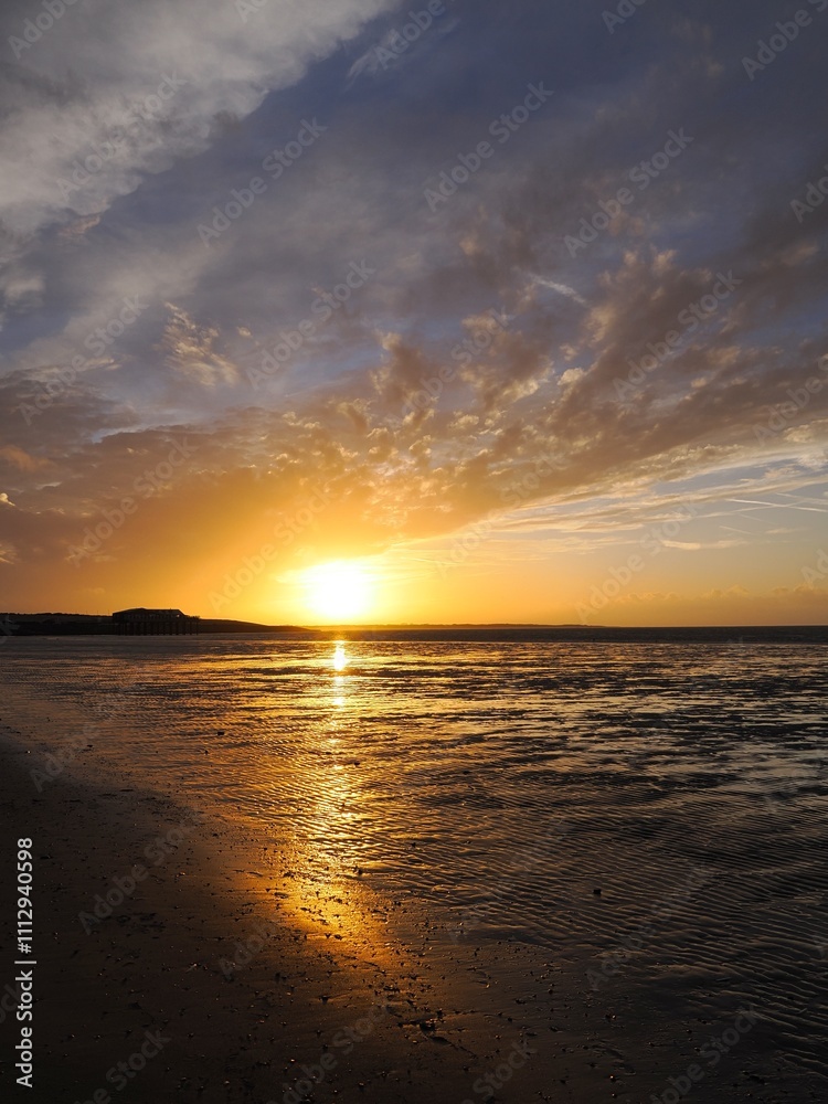 Obraz premium Sonnenuntergang an der niederländischen Nordsee