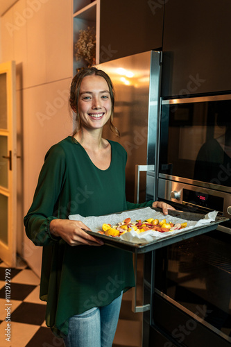 Female cook preparing Christmas dinner photo